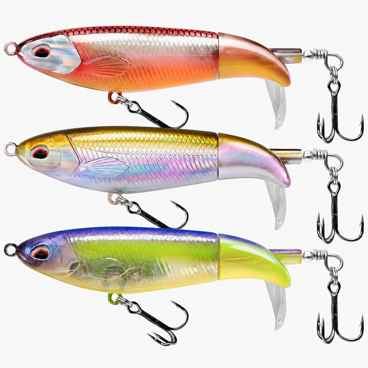 A set of three TRUSCEND topwater fishing lures in minnow design with holographic eyes and realistic fish scales. The lures are in different colors, including silver, gold, and blue.