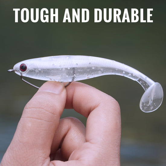 Hand holding a clear fishing lure with text 'Tough and Durable' above it.