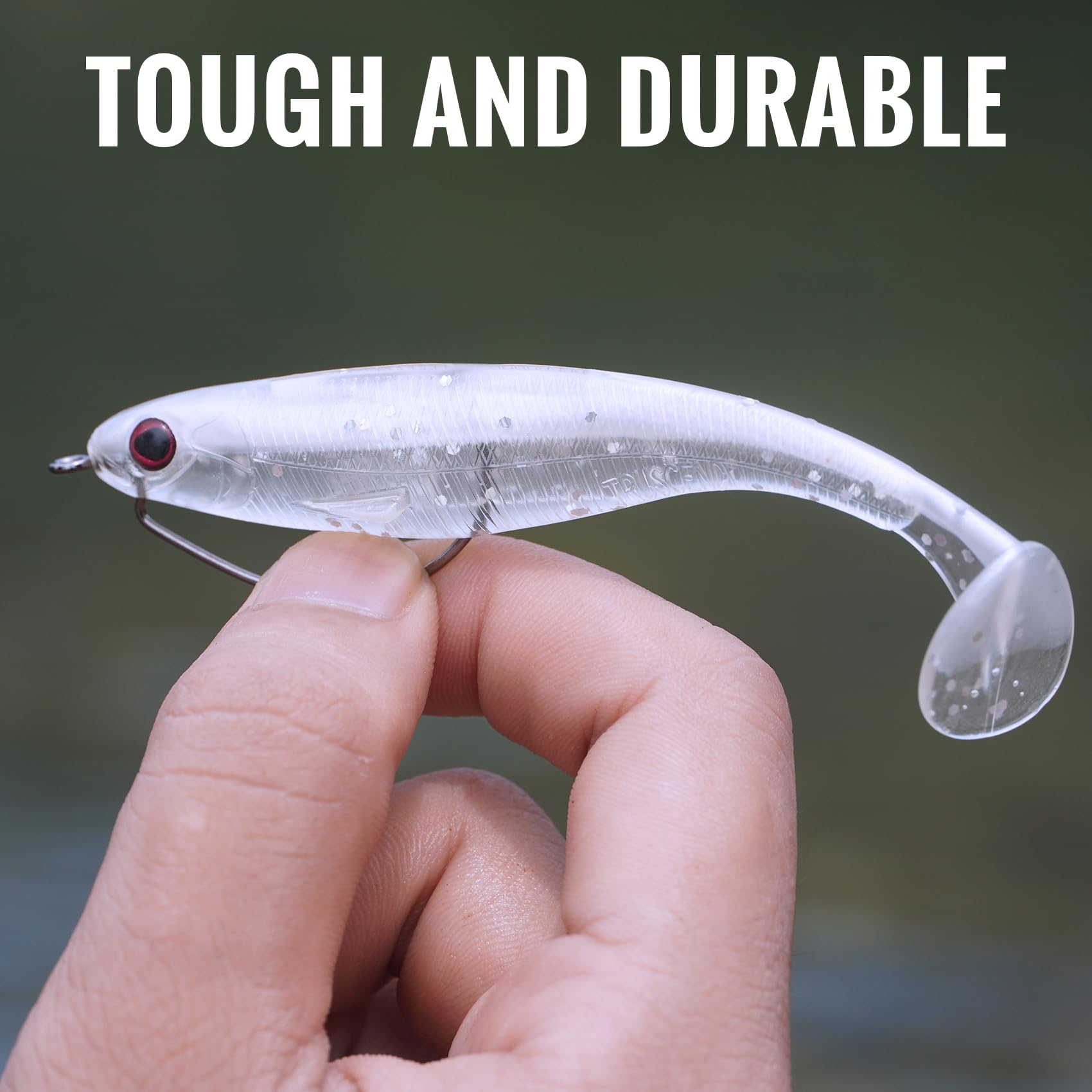 Hand holding a clear fishing lure with text 'Tough and Durable' above it.
